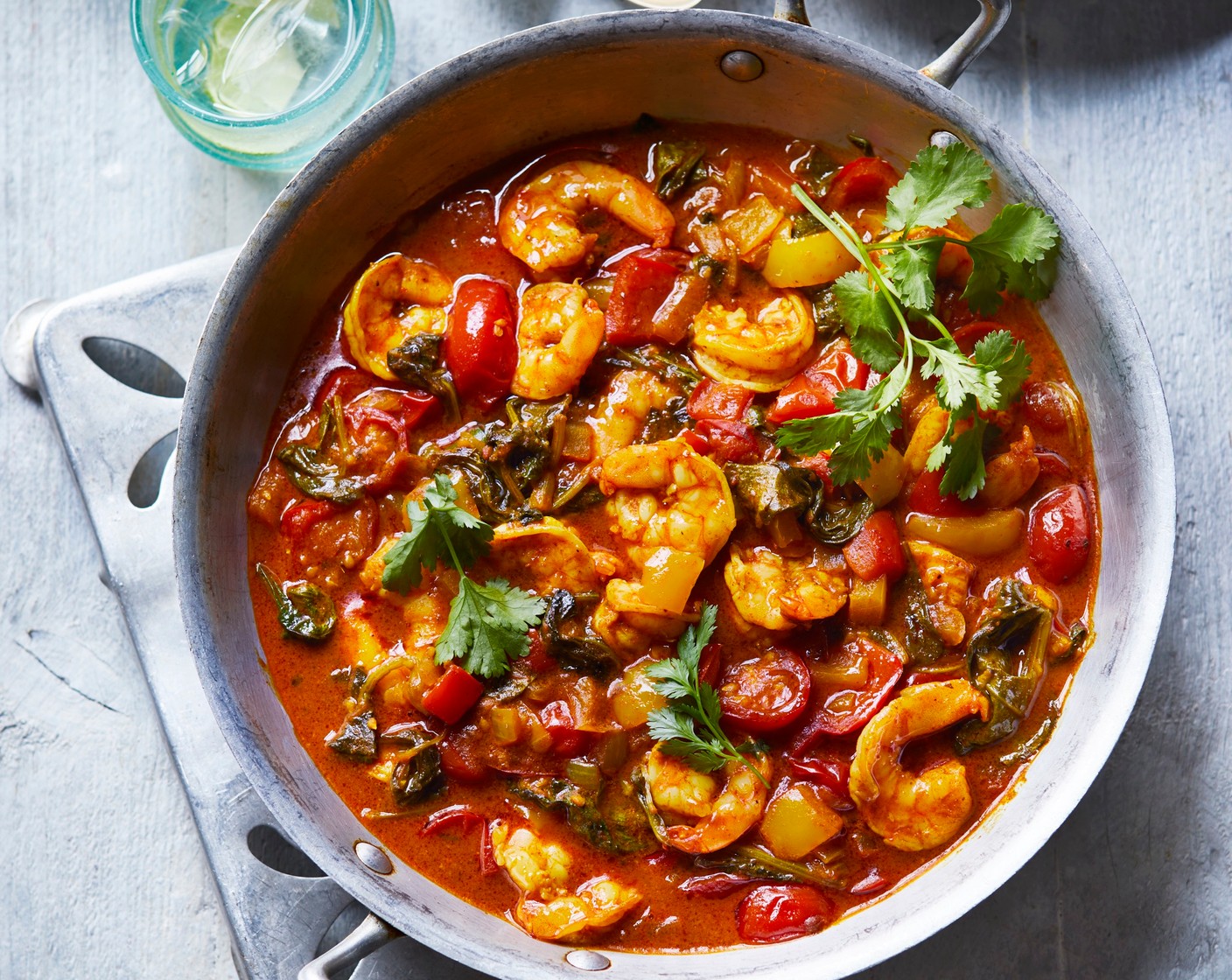 step 6 Divide the curry between 4 serving bowls. Serve alongside the rice and scattered with the fresh coriander (10 g).